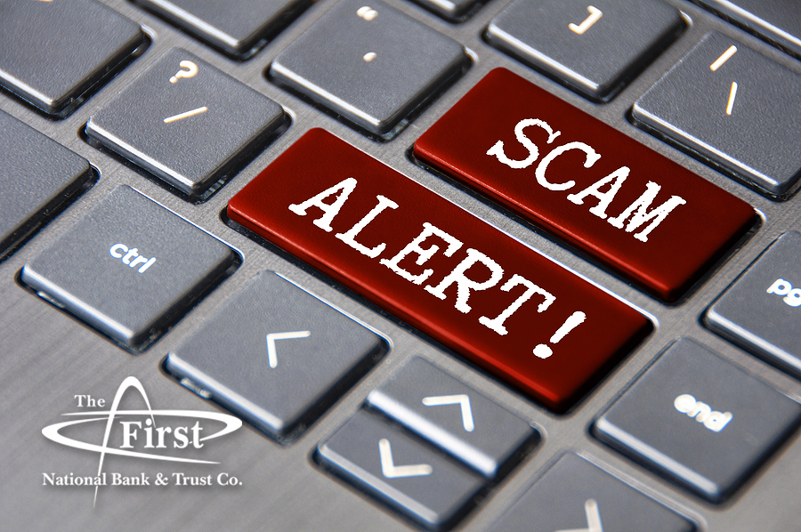 Scam Alert text on laptop keyboard. Scam and fraud concept.